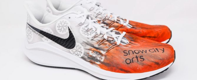 Custom sneakers showing the Snow City Arts logo, as worn by Chicago Bears coach Matt Nagy as a part of the "My Cause, My Cleats" campaign